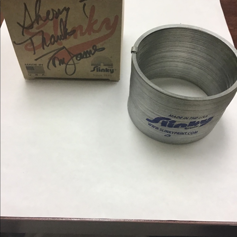SLINKY - in box signed by Tom James
